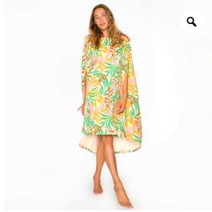 the Seea changing cape - vide green.